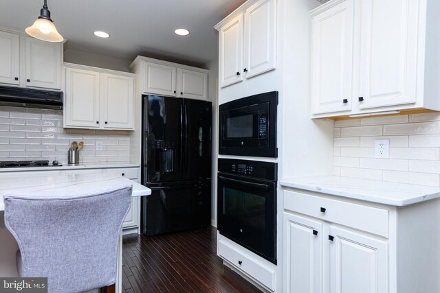 24 Furlong Rd, Douglassville, PA 19518 - kitchen with black appliances, white cabinets, under cabinet range hood, dark wood finished floors, and recessed lighting
