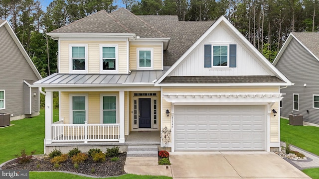 22543 Bradbury Way, Georgetown, DE 19947 - view of front facade featuring a porch, concrete driveway, a shingled roof, central AC unit, and a front yard