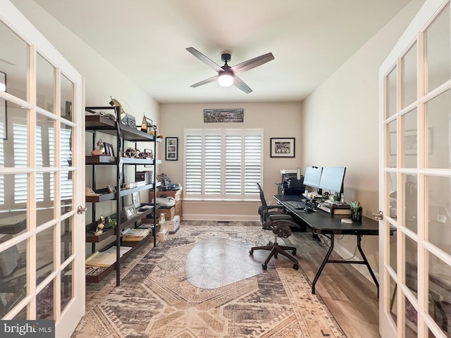 22543 Bradbury Way, Georgetown, DE 19947 - office space with french doors, wood finished floors, and a ceiling fan