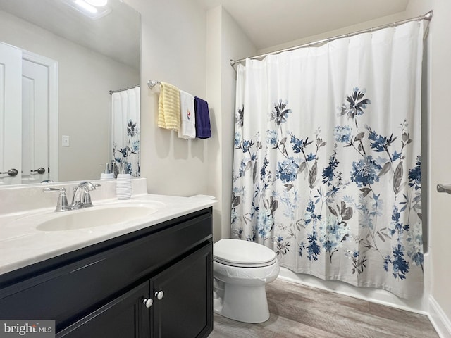 22543 Bradbury Way, Georgetown, DE 19947 - full bath with wood finished floors, vanity, toilet, and a shower with shower curtain