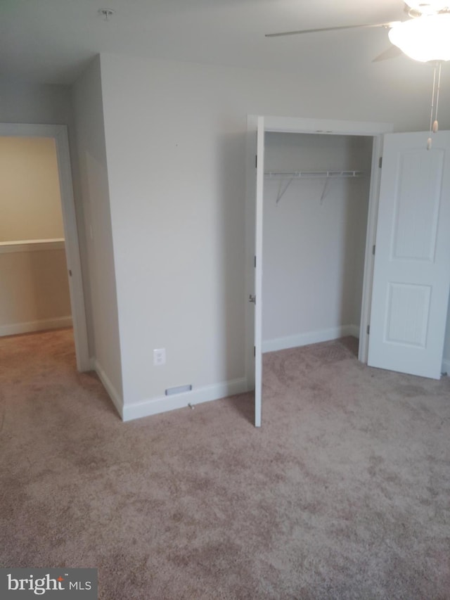 10019 Maids Fancy Way, Hagerstown, MD 21740 - unfurnished bedroom featuring carpet flooring, a closet, baseboards, and a ceiling fan