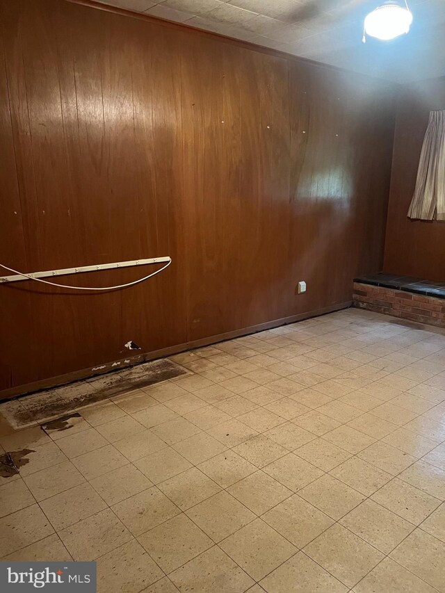 5933 Rawley Pike, Rockingham, VA 22801 - unfurnished room featuring tile patterned floors and wooden walls