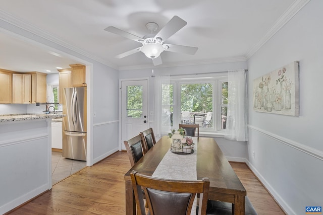 676 Victorian Ct, Charlottesville, VA 22901 - dining space with light wood-style flooring, crown molding, a ceiling fan, and baseboards