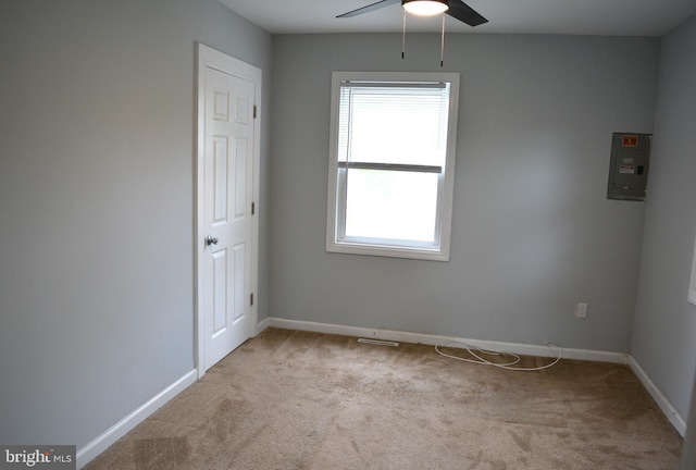 23 Foxglove St, Browns Mills, NJ 08015 - carpeted spare room featuring electric panel, plenty of natural light, a ceiling fan, and baseboards