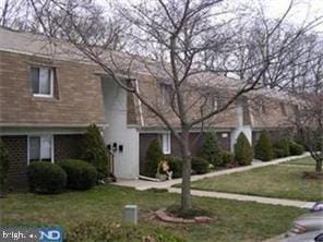 411 N Stiles Ave Unit A5, Maple Shade, NJ 08052 - view of front facade with a front lawn