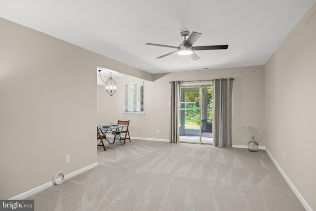 411 N Stiles Ave Unit A5, Maple Shade, NJ 08052 - empty room with carpet floors, ceiling fan, and a chandelier