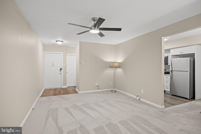 411 N Stiles Ave Unit A5, Maple Shade, NJ 08052 - unfurnished living room featuring light colored carpet and ceiling fan