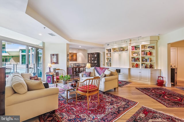 5610 Wisconsin Ave Unit 406, Chevy Chase, MD 20815 - living area featuring wood finished floors