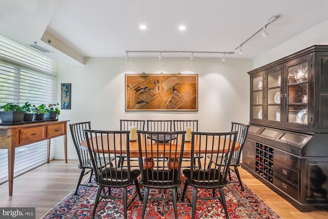 5610 Wisconsin Ave Unit 406, Chevy Chase, MD 20815 - dining room with track lighting, light wood-style floors, and recessed lighting
