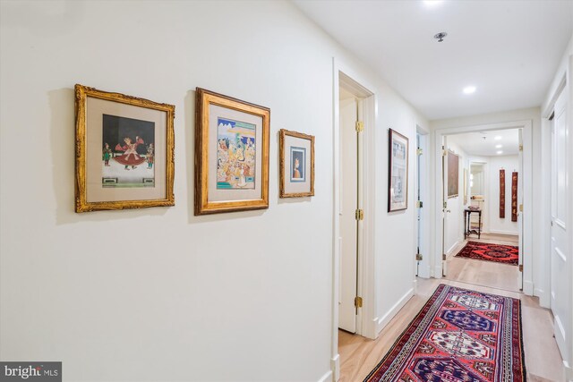 5610 Wisconsin Ave Unit 406, Chevy Chase, MD 20815 - corridor featuring light wood-style flooring and recessed lighting