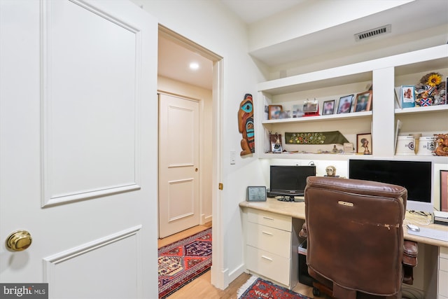 5610 Wisconsin Ave Unit 406, Chevy Chase, MD 20815 - office featuring built in desk and light wood finished floors