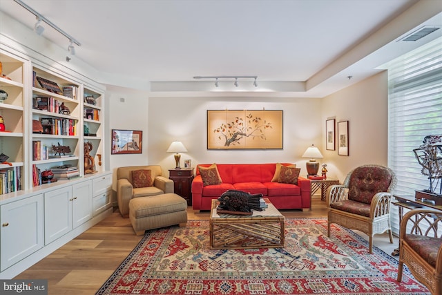 5610 Wisconsin Ave Unit 406, Chevy Chase, MD 20815 - living area featuring track lighting and wood finished floors