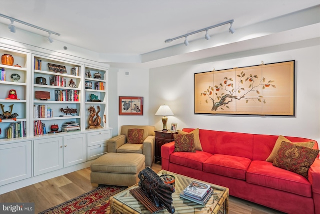 5610 Wisconsin Ave Unit 406, Chevy Chase, MD 20815 - living area featuring track lighting and wood finished floors