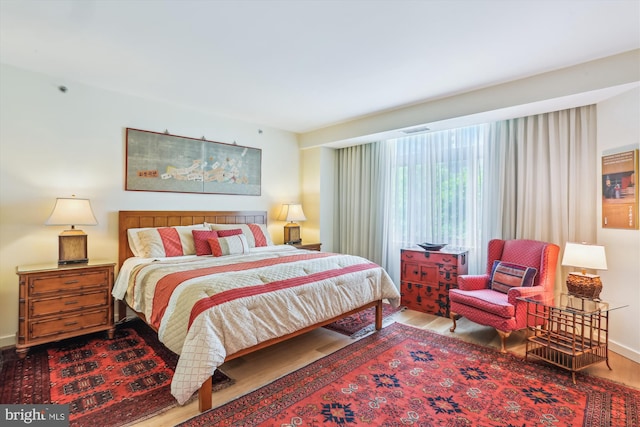 5610 Wisconsin Ave Unit 406, Chevy Chase, MD 20815 - bedroom with wood finished floors