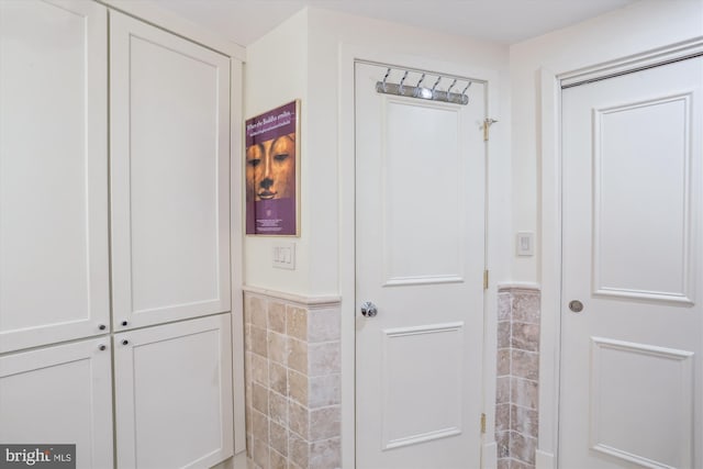 5610 Wisconsin Ave Unit 406, Chevy Chase, MD 20815 - bathroom with tile walls and wainscoting