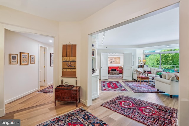 5610 Wisconsin Ave Unit 406, Chevy Chase, MD 20815 - hall featuring light wood finished floors