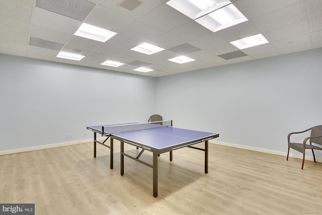 5610 Wisconsin Ave Unit 406, Chevy Chase, MD 20815 - rec room with a drop ceiling and light wood-style flooring