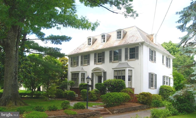 4305 Bradley Ln, Chevy Chase, MD 20815 - view of front of home featuring a high end roof and stucco siding
