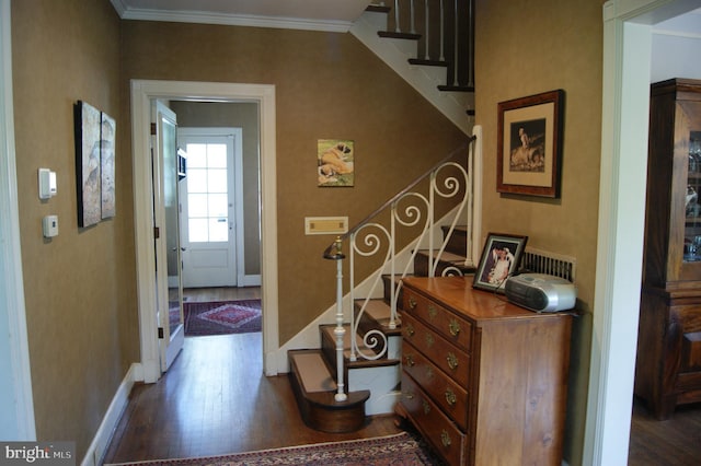 4305 Bradley Ln, Chevy Chase, MD 20815 - foyer with wood finished floors, stairs, ornamental molding, and baseboards