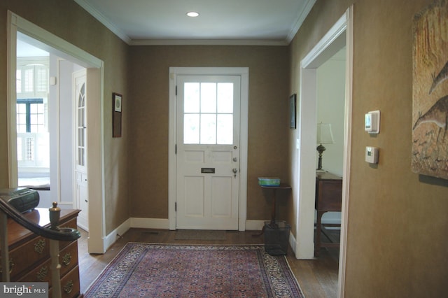 4305 Bradley Ln, Chevy Chase, MD 20815 - entryway featuring wood finished floors, ornamental molding, and baseboards