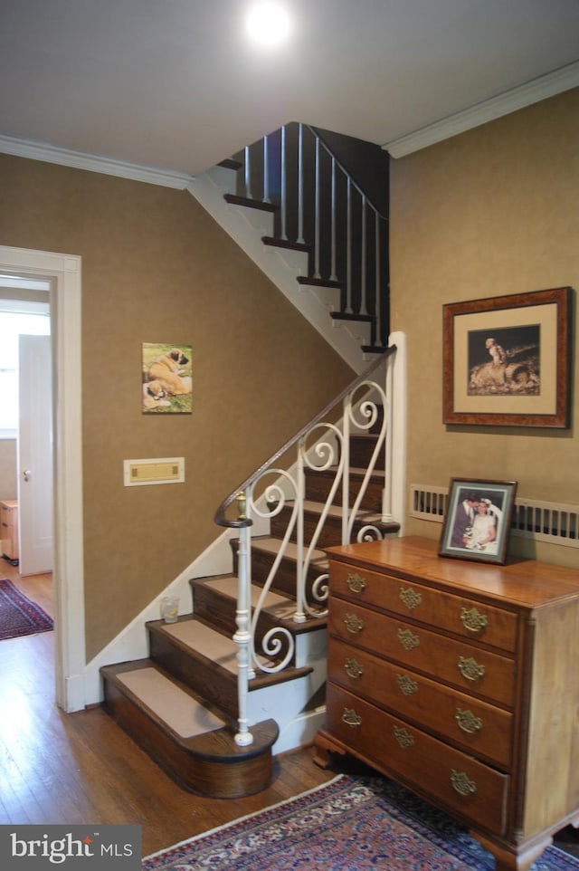 4305 Bradley Ln, Chevy Chase, MD 20815 - stairs featuring wood finished floors, crown molding, and baseboards