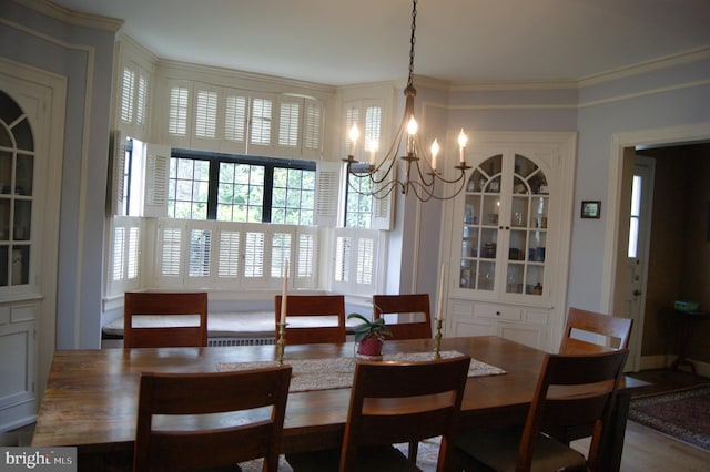 4305 Bradley Ln, Chevy Chase, MD 20815 - dining room with a chandelier and crown molding