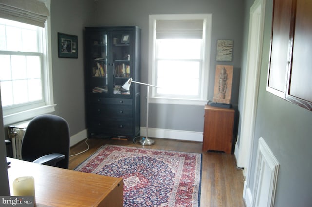 4305 Bradley Ln, Chevy Chase, MD 20815 - office featuring healthy amount of natural light, wood finished floors, and baseboards