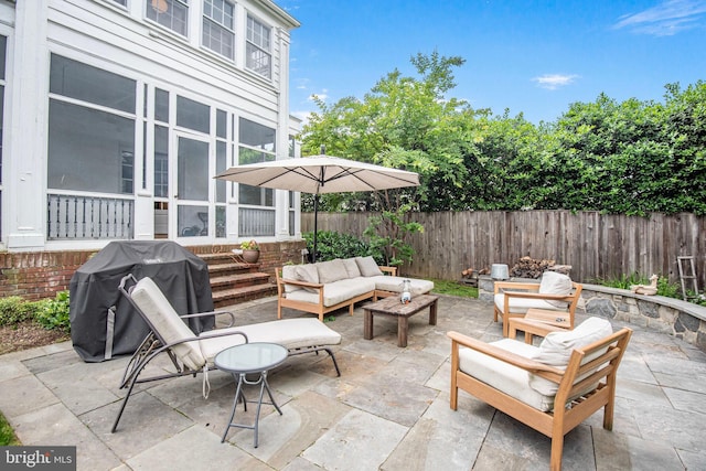 4305 Bradley Ln, Chevy Chase, MD 20815 - fenced backyard with an outdoor living space, a patio area, grilling area, and a sunroom