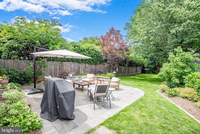 4305 Bradley Ln, Chevy Chase, MD 20815 - view of yard featuring a patio and an outdoor living space