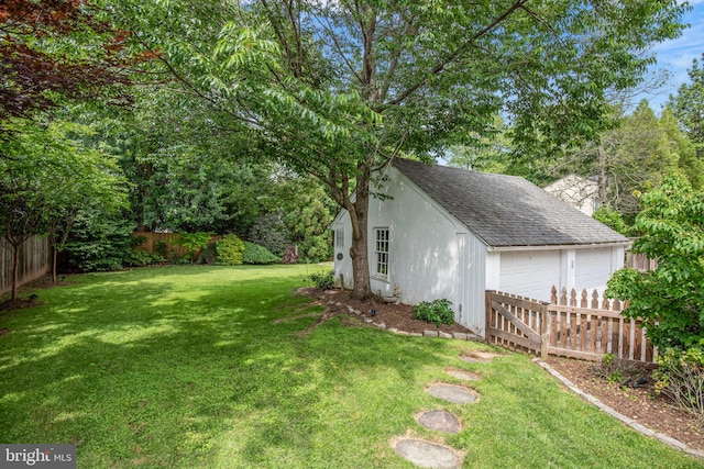 4305 Bradley Ln, Chevy Chase, MD 20815 - view of yard featuring an outbuilding and a detached garage