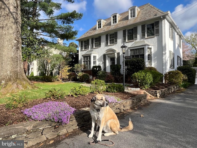 4305 Bradley Ln, Chevy Chase, MD 20815 - view of front of home featuring stucco siding