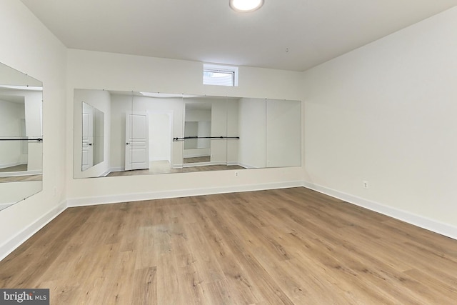 23219 Christopher Thomas Ln, Brambleton, VA 20148 - spare room with wood finished floors and baseboards