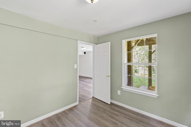 1562 Falling Brook Ct, Odenton, MD 21113 - empty room featuring baseboards and wood finished floors