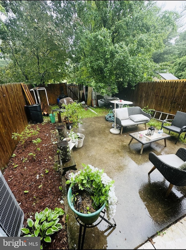 11529 Fenchurch Ct, Germantown, MD 20876 - fenced backyard featuring a patio and an outdoor living space