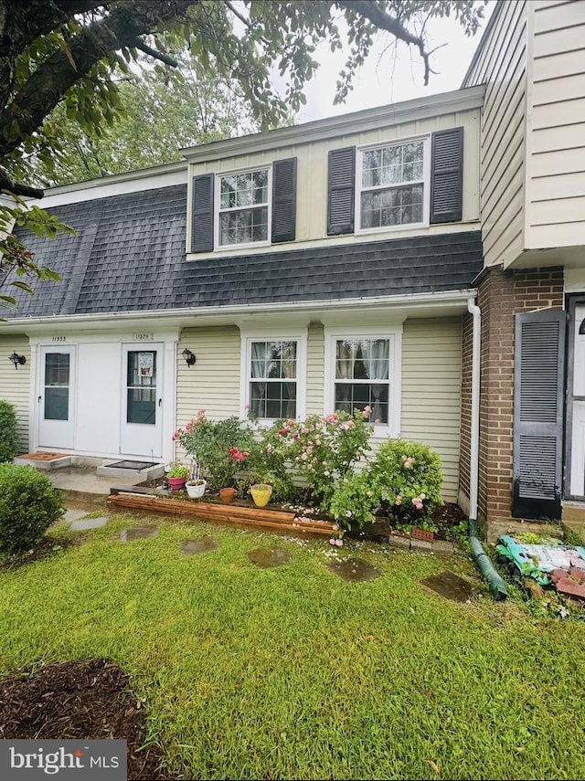 11529 Fenchurch Ct, Germantown, MD 20876 - view of front facade with roof with shingles, a front lawn, and mansard roof