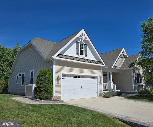 35516 Hedgerow Ln, Rehoboth Beach, DE 19971 - view of front of home with a standing seam roof, driveway, roof with shingles, a front lawn, and metal roof