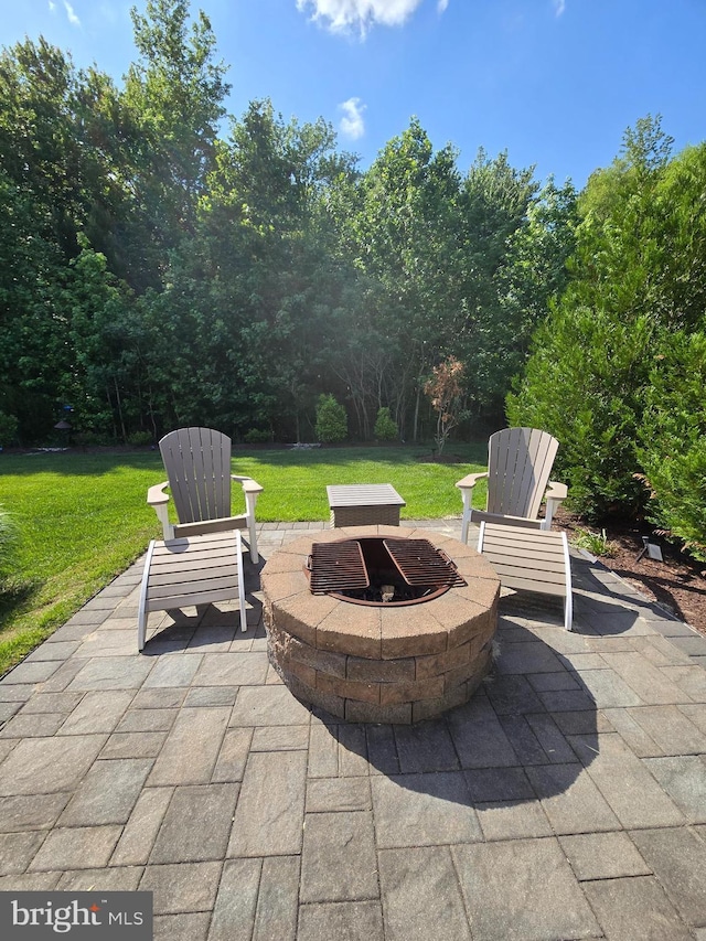 35516 Hedgerow Ln, Rehoboth Beach, DE 19971 - view of patio featuring an outdoor fire pit