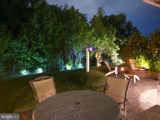 35516 Hedgerow Ln, Rehoboth Beach, DE 19971 - view of patio / terrace with a fire pit and outdoor dining space