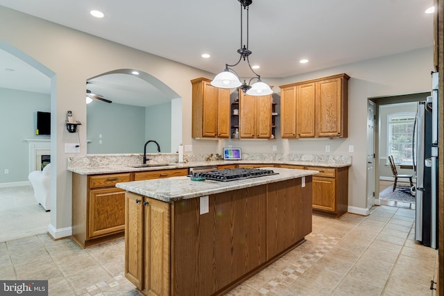 6422 Hard Bargain Cir, Indian Head, MD 20640 - kitchen with a sink, stainless steel appliances, recessed lighting, a kitchen island, and baseboards