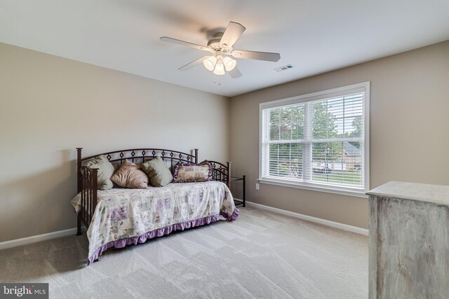 6422 Hard Bargain Cir, Indian Head, MD 20640 - bedroom with light carpet, baseboards, and a ceiling fan