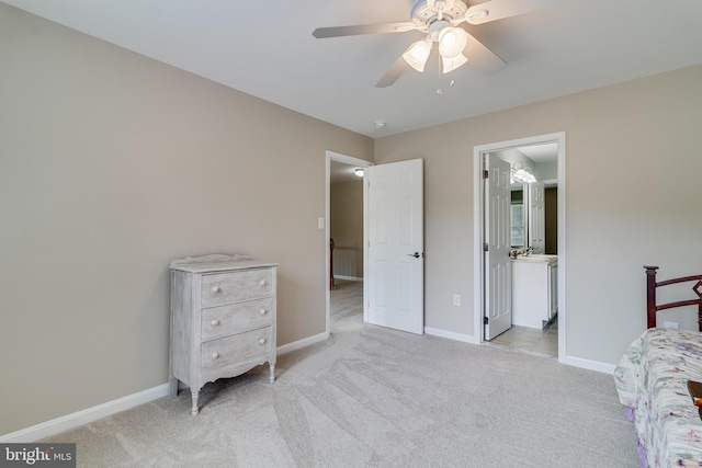 6422 Hard Bargain Cir, Indian Head, MD 20640 - carpeted bedroom with baseboards, ceiling fan, and ensuite bath