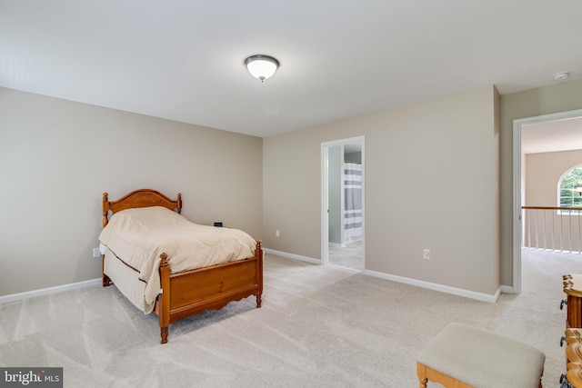 6422 Hard Bargain Cir, Indian Head, MD 20640 - bedroom featuring light colored carpet, baseboards, and connected bathroom