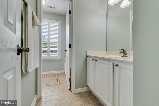 6422 Hard Bargain Cir, Indian Head, MD 20640 - bathroom with vanity, tile patterned flooring, and baseboards