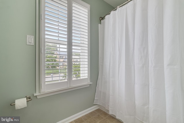 6422 Hard Bargain Cir, Indian Head, MD 20640 - full bath featuring baseboards and a shower with shower curtain