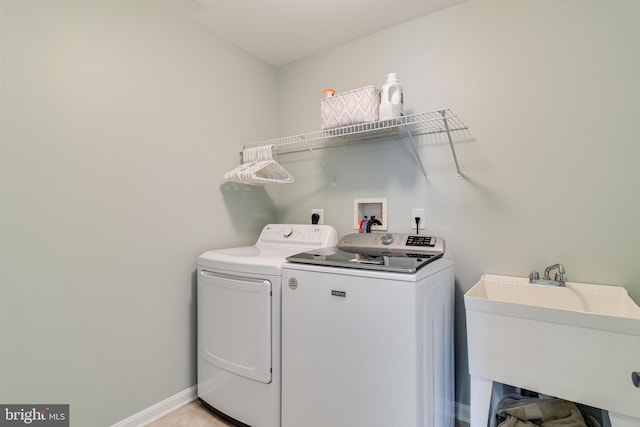 6422 Hard Bargain Cir, Indian Head, MD 20640 - laundry room with independent washer and dryer and baseboards