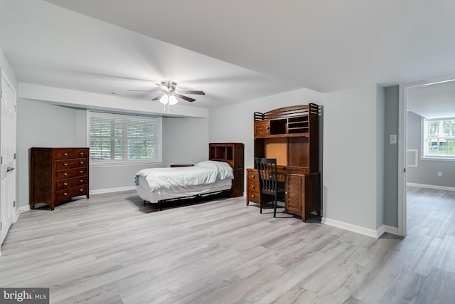 6422 Hard Bargain Cir, Indian Head, MD 20640 - bedroom featuring wood finished floors, baseboards, and a ceiling fan