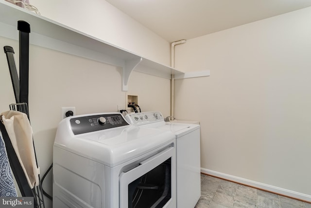 6422 Hard Bargain Cir, Indian Head, MD 20640 - laundry room featuring washing machine and clothes dryer and baseboards