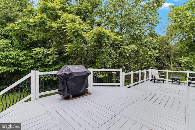 6422 Hard Bargain Cir, Indian Head, MD 20640 - wooden terrace with area for grilling and view of wooded area