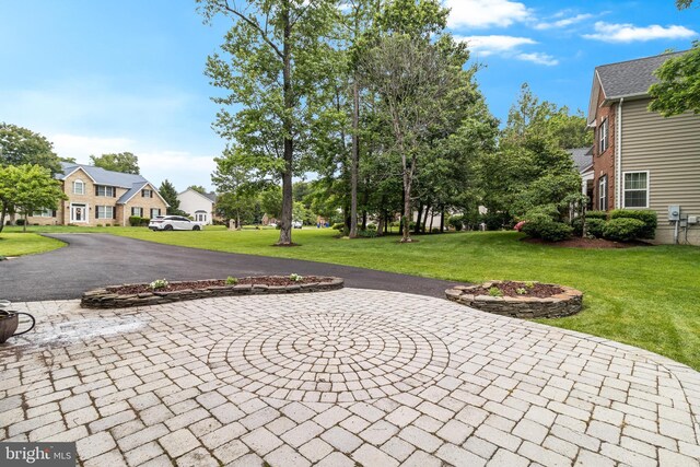 6422 Hard Bargain Cir, Indian Head, MD 20640 - view of property's community featuring a yard, a residential view, and curved driveway