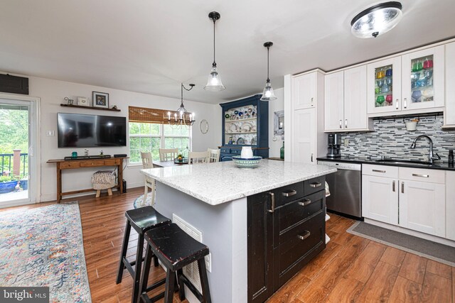 706 Melvin Rd, Telford, PA 18969 - kitchen featuring dishwasher, a sink, a kitchen breakfast bar, and white cabinets